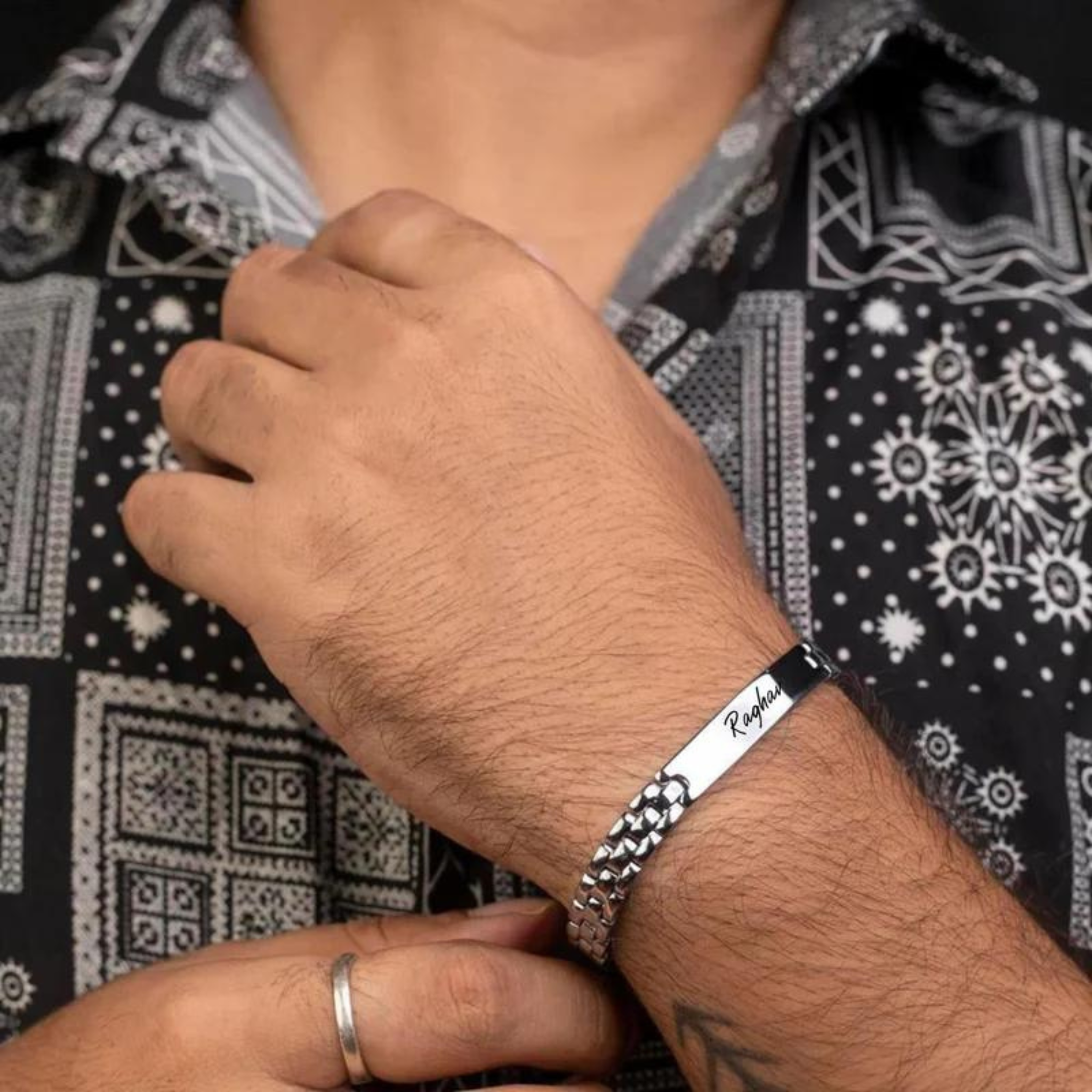 silver-bracelet-in-hand